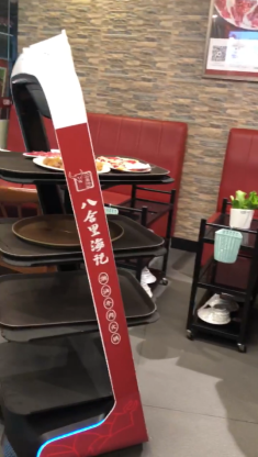 “潮?！被疱佊筒蜋C(jī)器人新店員，降本增效助力智慧經(jīng)營(yíng)